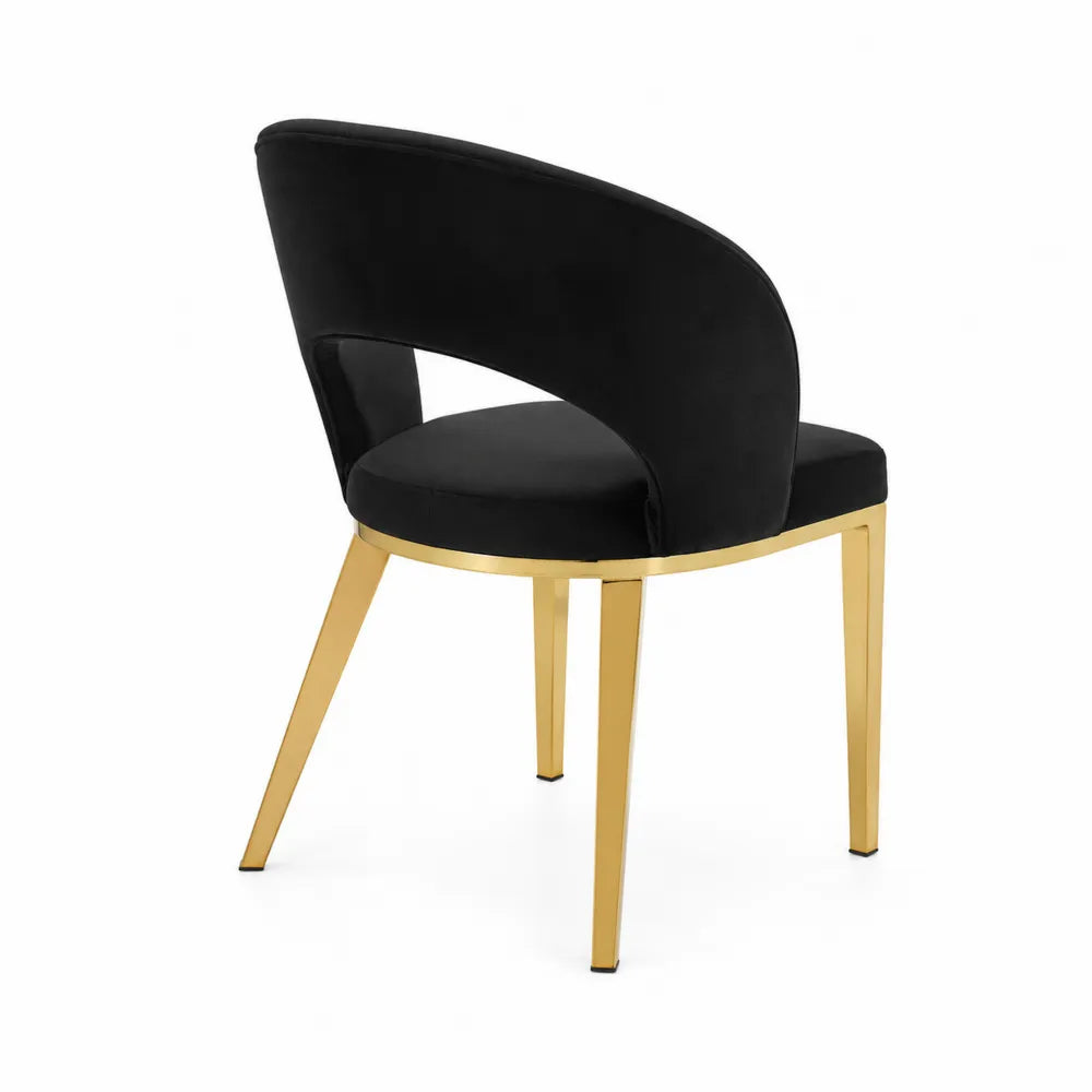 Chaise en velours noir avec structure métallique dorée